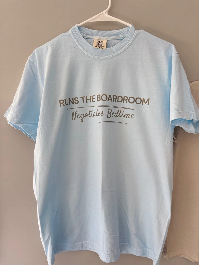 Runs the Boardroom. Negotiates Bedtime. - Adult Tee