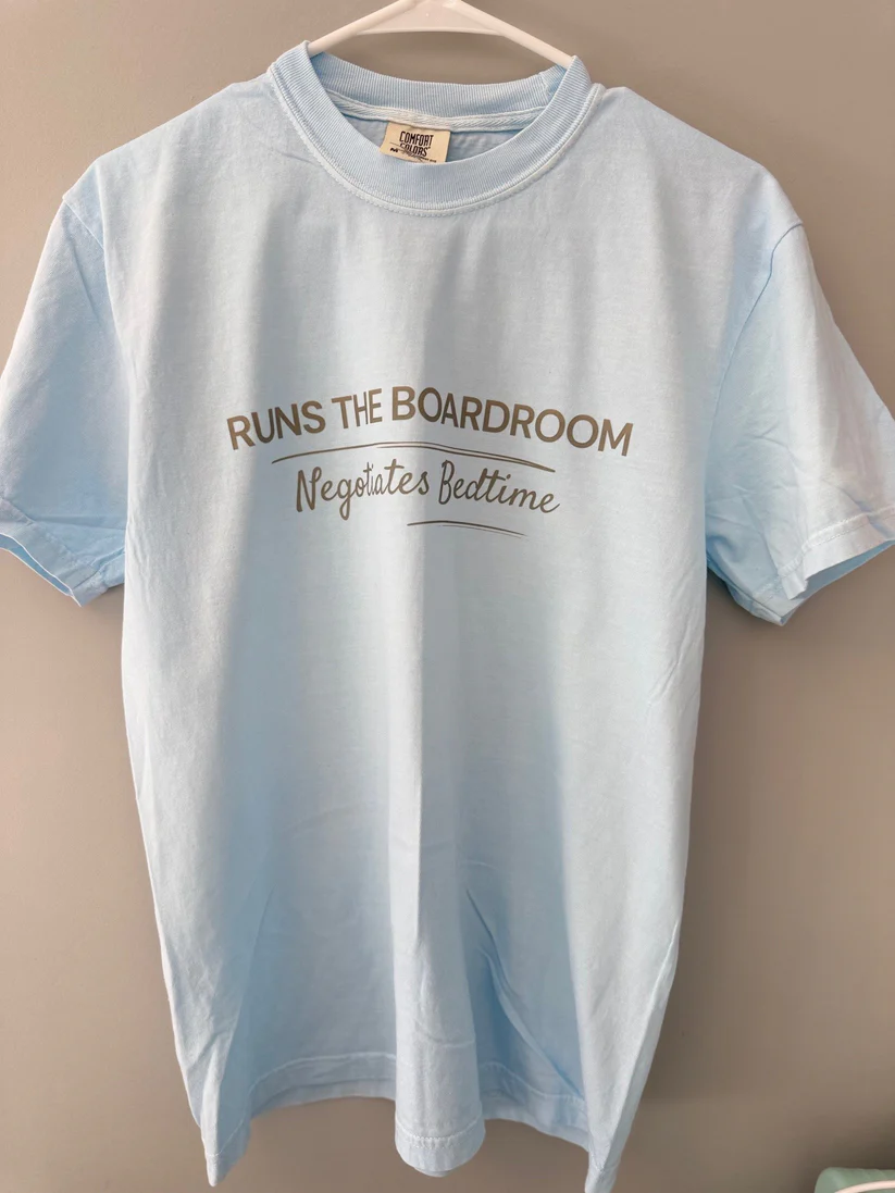 Runs the Boardroom. Negotiates Bedtime. - Adult Tee